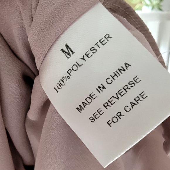 A blousy jumpsuit fully lined (except sleeves). - Picture 3 of 5